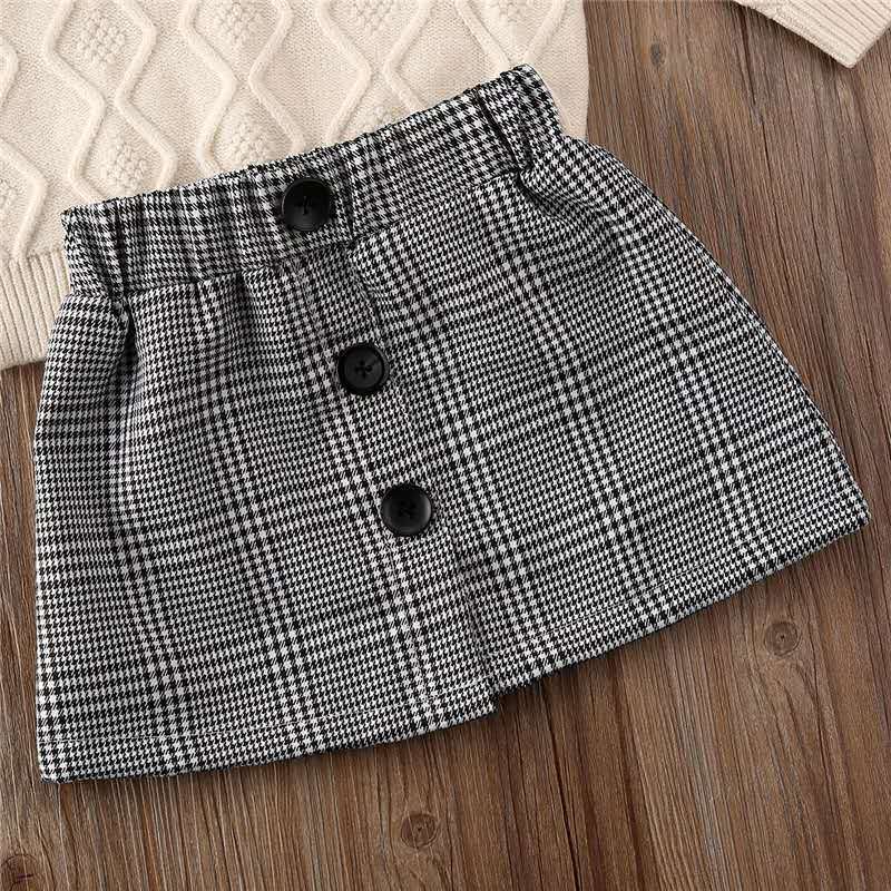 Turtleneck sweater + plaid skirt suit GO buy