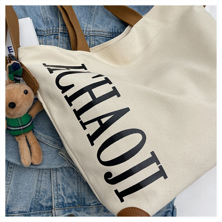 Women's Casual Large-capacity Canvas Shoulder Messenger Bag GO Buy